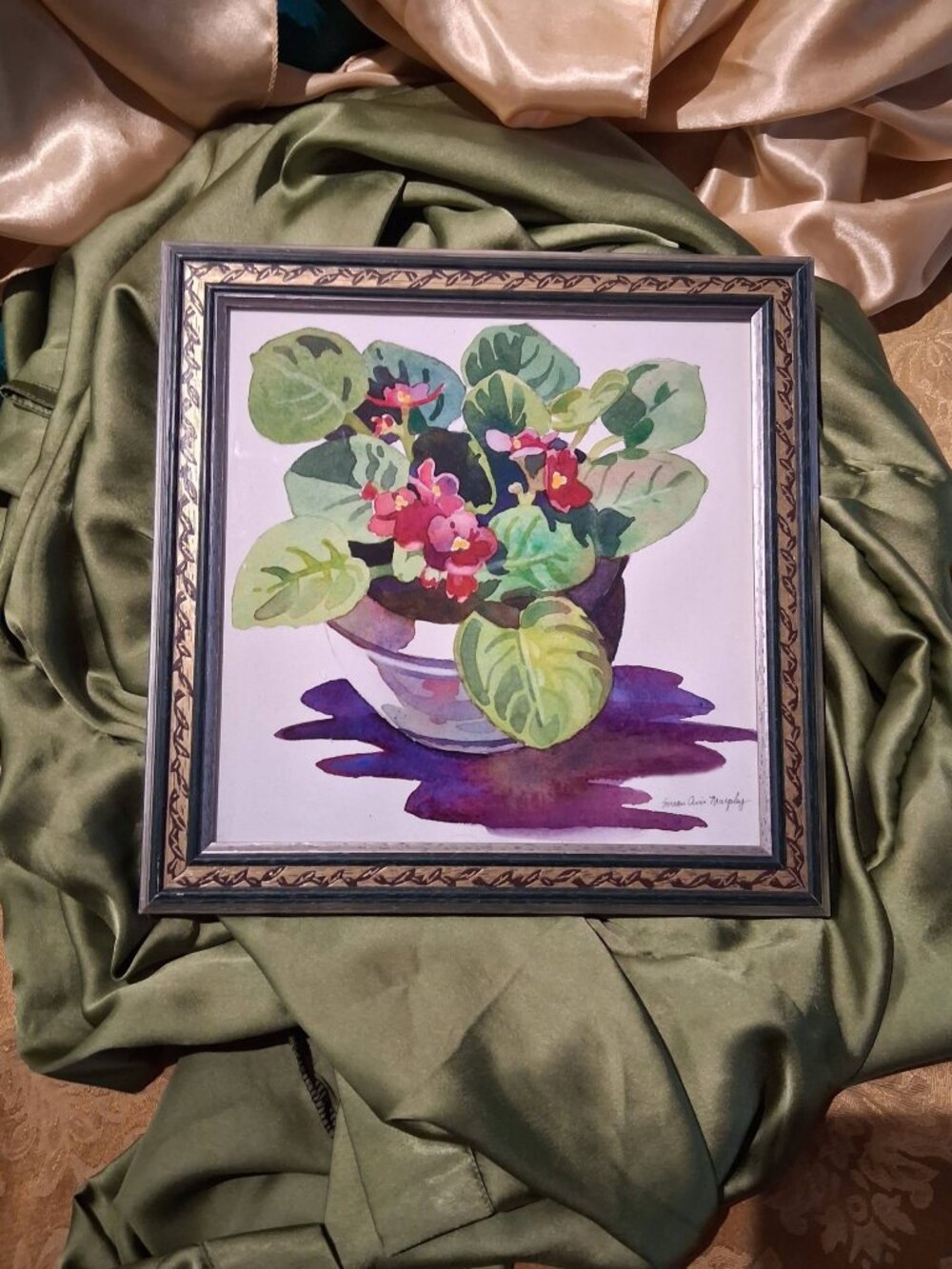 Vintage framed floral watercolor print featuring vibrant potted African violets